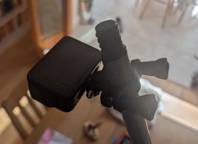 GoPro Hero 12, attached to a paint roller handle